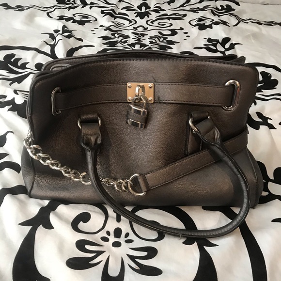 Charming Charlie Silver purse. $10